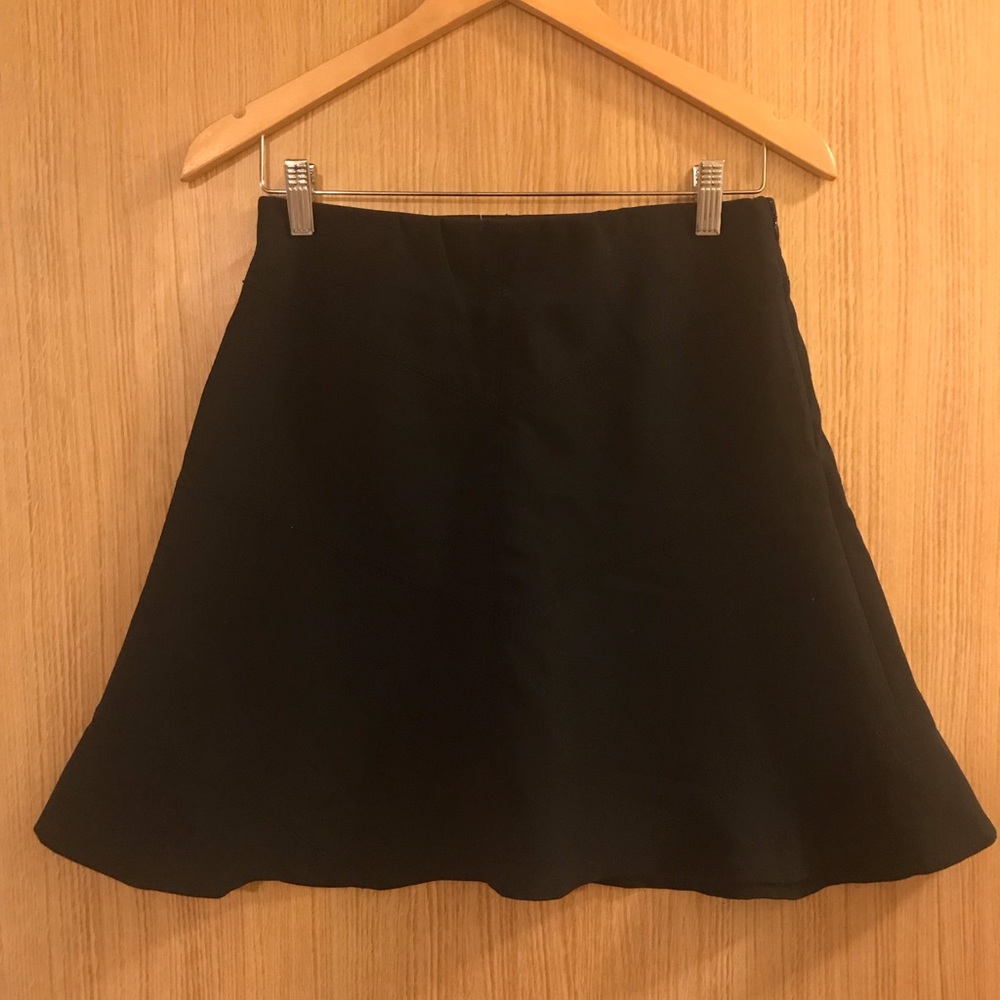 Black flippy midi skirt with angled stitching